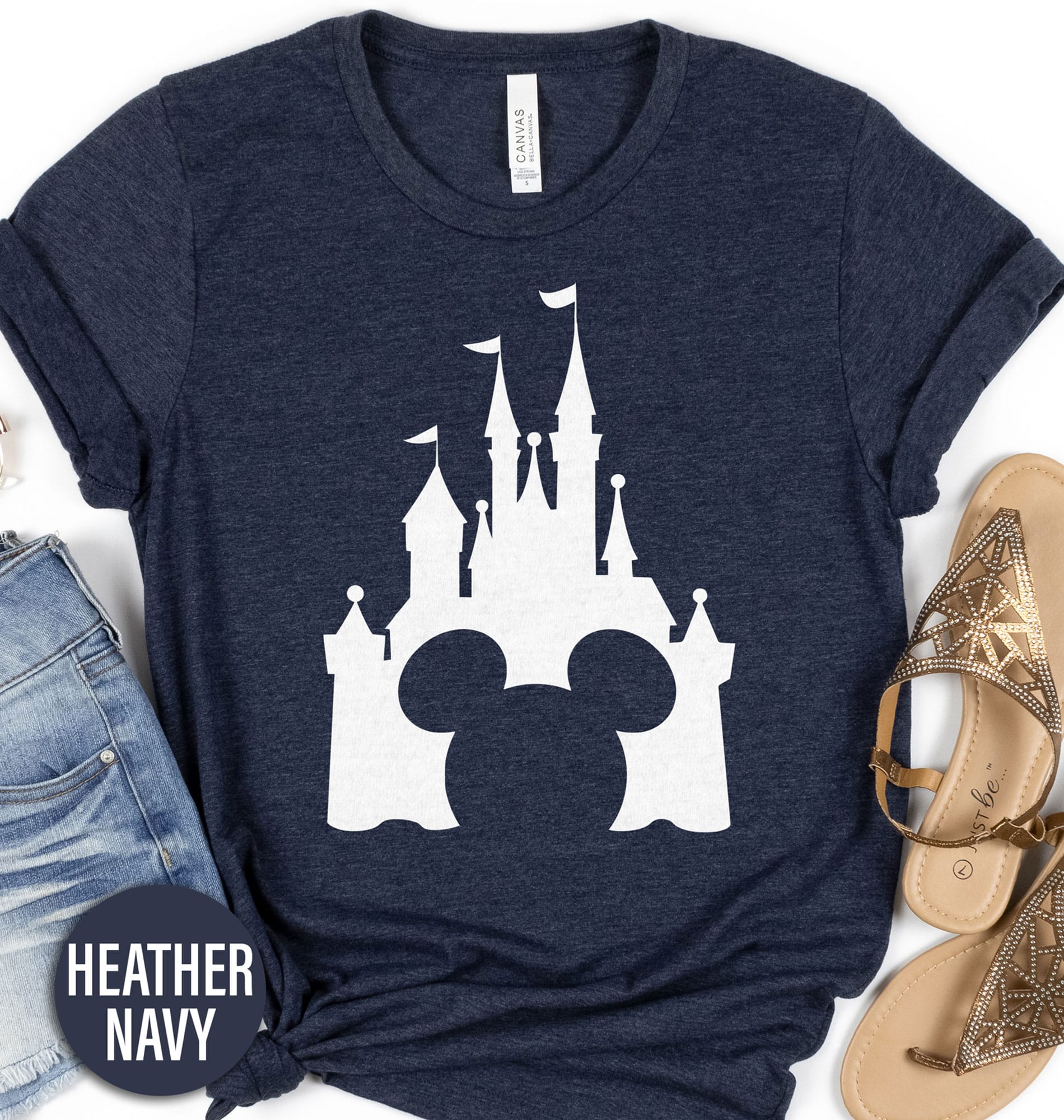 Disney Castle Mickey Shirt Disney Vacation Shirts Embrace the magic with our Disney Castle Mickey Shirt, the perfect addition to your Disney vacation apparel. Featuring an iconic Mickey Mouse silhouette set against the enchanting castle, this Magic Kingdom tee is ideal for family matching. Elevate your Disney park gear and make memories in style with this must-have outfit!