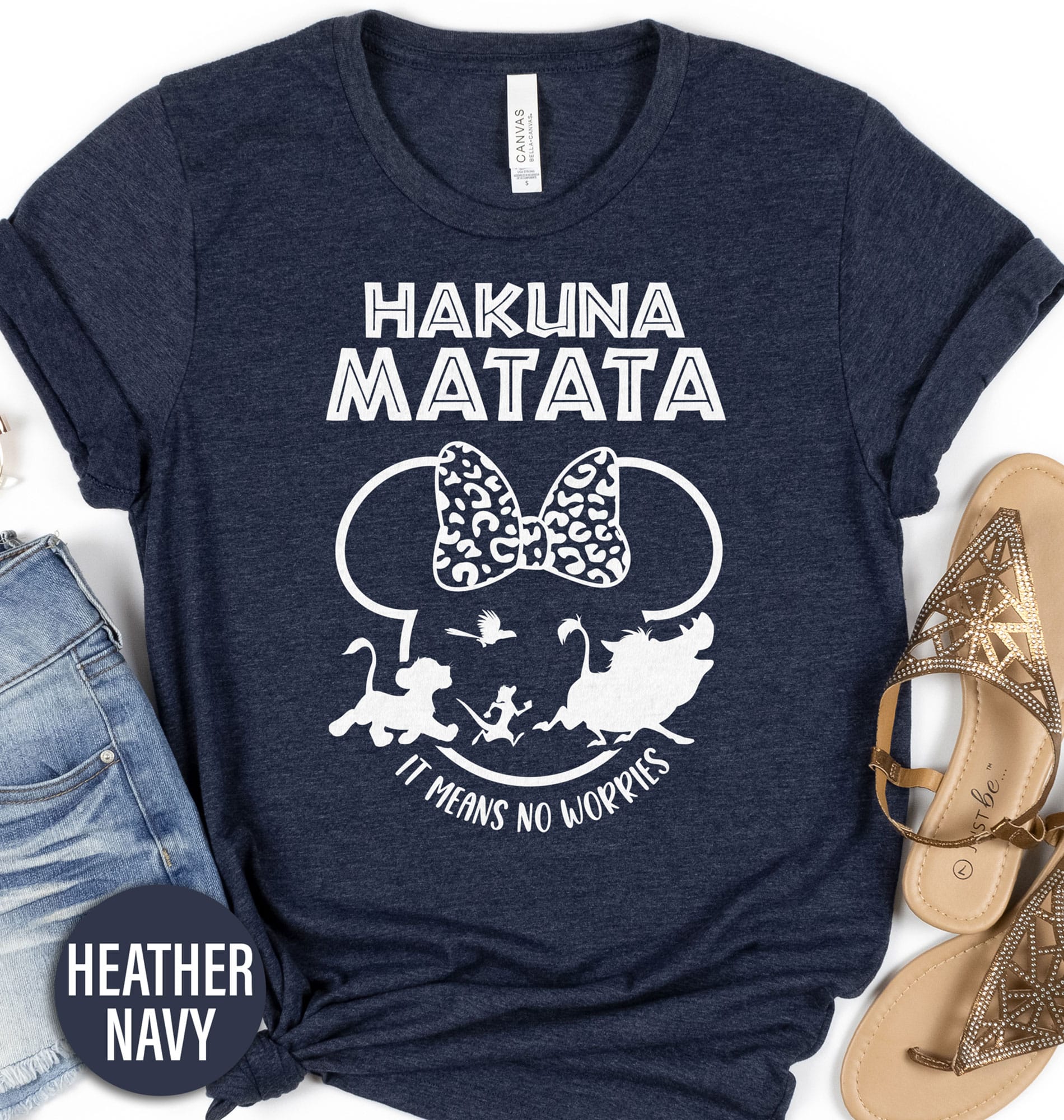 Hakuna Matata Minnie Shirt Disney Vacation Shirts Discover the magic with our Hakuna Matata Minnie Shirt, a perfect blend of Disney's Minnie Mouse and Lion King charm. Ideal for Disney family vacations, this unique Minnie Mouse Hakuna Matata top combines African Safari vibes with Disney theme park flair. Match in style with our enchanting Disney World shirts!