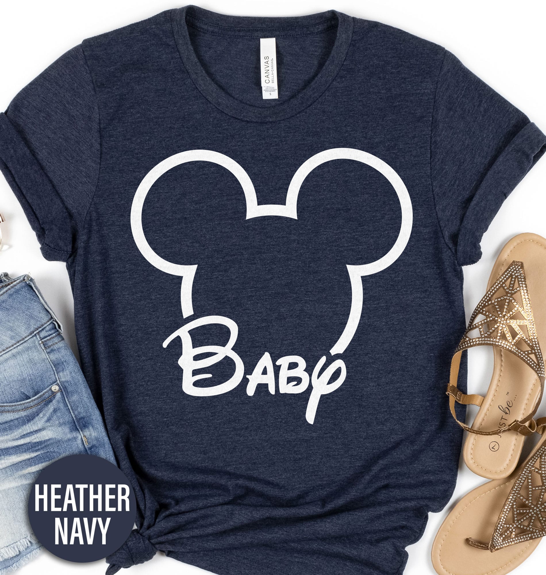 Disney Baby Shirt Disney Vacation Shirts Dress your little one in magic with our Disney Baby Shirt collection! From adorable Mickey Mouse tees to enchanting Disney Princess outfits, including Baby Yoda onesies and Lion King apparel. Our Frozen baby t-shirts and cute Disney character wear are perfect for your infant's next big adventure. Shop now!
