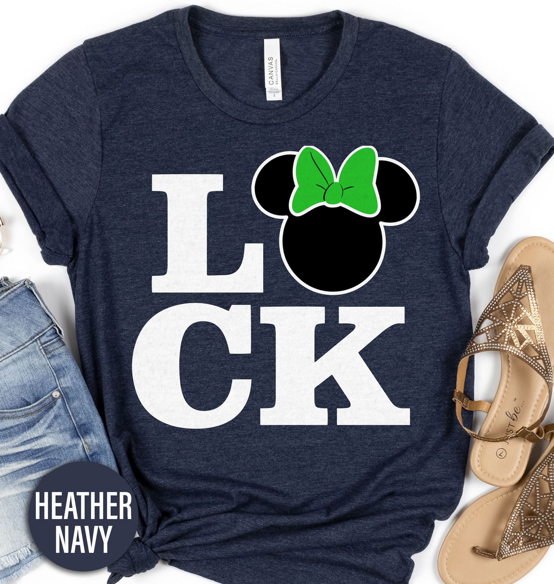 Disney Minnie Luck Shirt Disney Vacation Shirts Celebrate St. Patrick's Day in magical style with our Disney Minnie Luck Shirt! Featuring Minnie Mouse adorned in festive green, this lucky charm shirt is perfect for Disney family matching. Embrace the holiday spirit with this Minnie clover design, ideal for theme park adventures or as joyful Disney holiday wear.