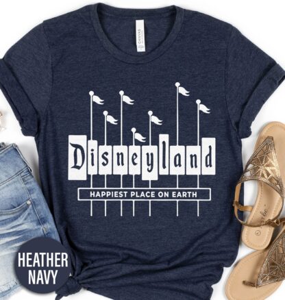 Disneyland Flag Shirt Disney Vacation Shirts Celebrate your patriotism Disney-style with our Disneyland Flag Shirt! Perfect for Fourth of July or any day, this unique tee blends American pride with magical Disney charm. Featuring a vibrant American flag design with a Disneyland twist, it's the ultimate piece of patriotic Disney clothing for USA Disney apparel enthusiasts.