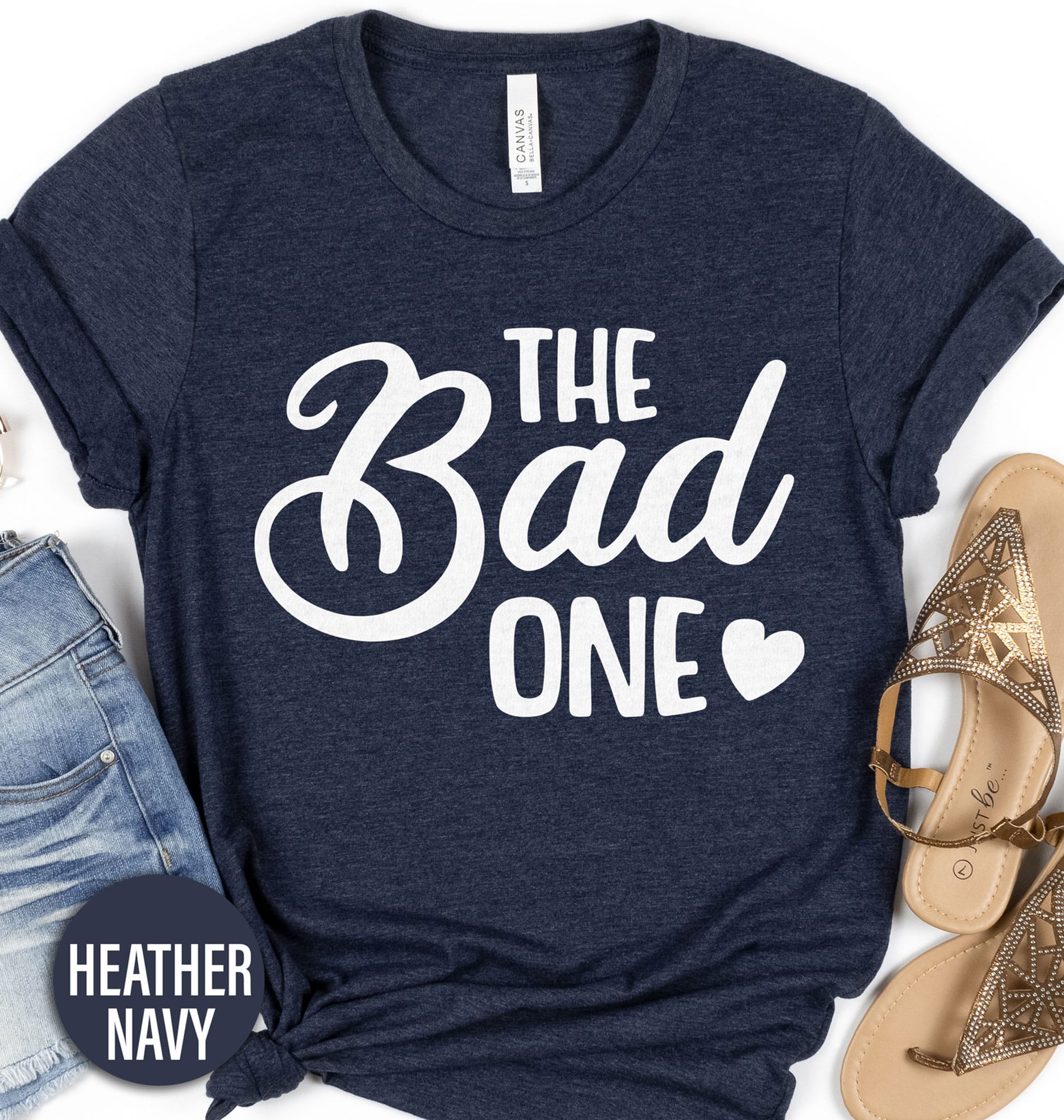 The Bad One Wedding Shirt Wedding Vacation The The Bad One Wedding Shirt comes in many different styles and colors.