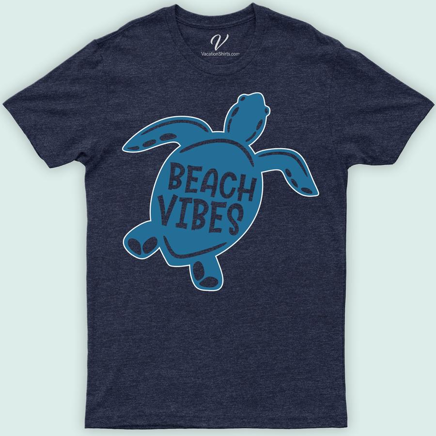 Turtle Beach VIbes Shirt Beach Vacation Shirts Dive into summer with the Turtle Beach Vibes Shirt from VacationShirts.com. This ocean-inspired tee, featuring a captivating sea turtle graphic, embodies coastal fashion at its finest. Perfect for beach parties or casual outings, it's your go-to for island style and tropical shirts online. Embrace the essence of beachwear fashion today!
