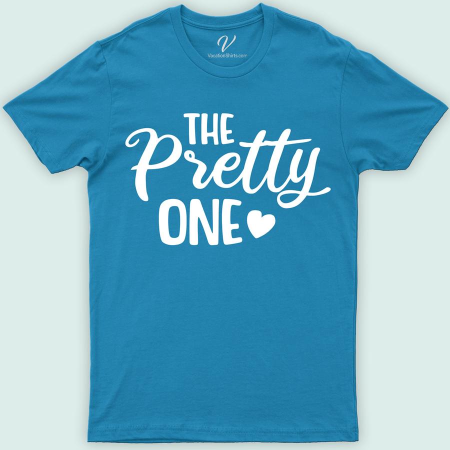 The Pretty One Wedding Shirt Wedding Vacation Shirts Elevate your bridal celebration with The Pretty One Wedding Shirt from VacationShirts.com. Perfect for brides and their squads, this elegant, custom shirt blends style and sentiment. Ideal for bachelorette parties, bridal showers, and wedding day festivities, it promises personalized charm and matching elegance for the entire bridal party. Embrace unforgettable moments in unmatched style.