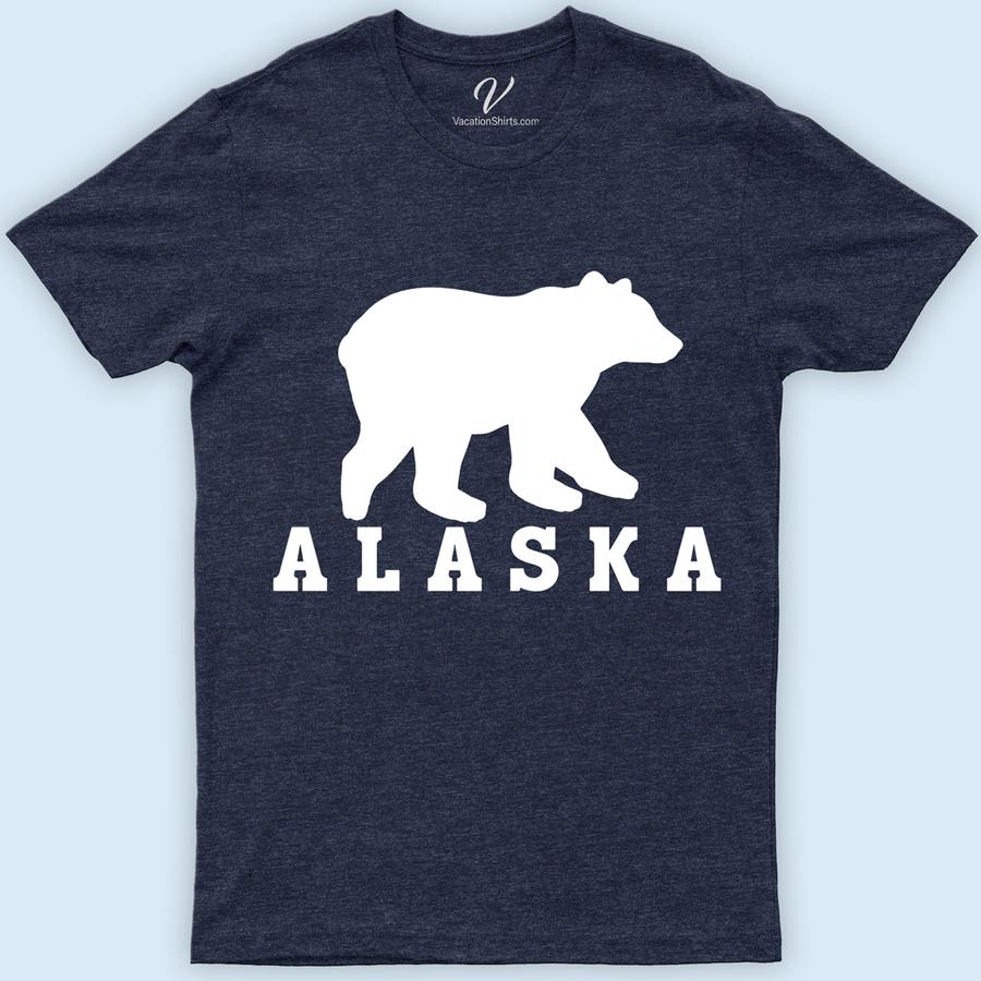 Alaska Bear Sillouhette Tee Alaska Vacation Shirts Embrace the wild with our Alaska Bear Silhouette Tee from VacationShirts.com. This captivating bear graphic tee, featuring a striking animal silhouette against Alaska's majestic wilderness, is the perfect addition to your outdoor adventure clothing. Crafted for nature enthusiasts, this wildlife tee Alaska embodies the spirit of Alaskan wildlife apparel. A must-have Alaska souvenir t-shirt!