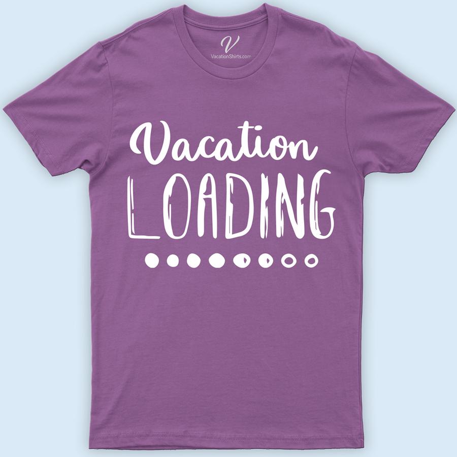 Vacation Loading Dots Tee Vacation Shirts Embark on your next adventure with our Vacation Loading Dots Tee! Perfect for travel enthusiasts, this funny vacation shirt captures the excitement of holiday countdowns and tropical getaways. Ideal for family vacations, road trips, or beach escapes, it's your go-to summer vacation apparel. Let the adventure await in style!