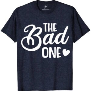 The Bad One Wedding Shirt Wedding Vacation Shirts Unleash the laughter at your wedding with The Bad One Wedding Shirt from VacationShirts.com! Perfect for bachelor parties and groomsmen, this unique wedding attire blends wedding humor with novelty. A creative groom's gift, it's customizable, making every shirt a humorous, memorable addition to your wedding party shirts collection.