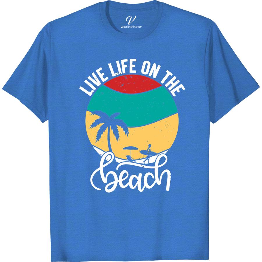 Live Life On The Beach Tee - Tropical Vacation Shirt Beach Vacation Shirts Escape to paradise with our Live Life On The Beach Tee! With its vibrant tropical print, this beach vacation shirt is perfect for lounging on the sand or exploring a tropical island. Embrace the beach lifestyle with this must-have tropical tee and make every day feel like a vacation.