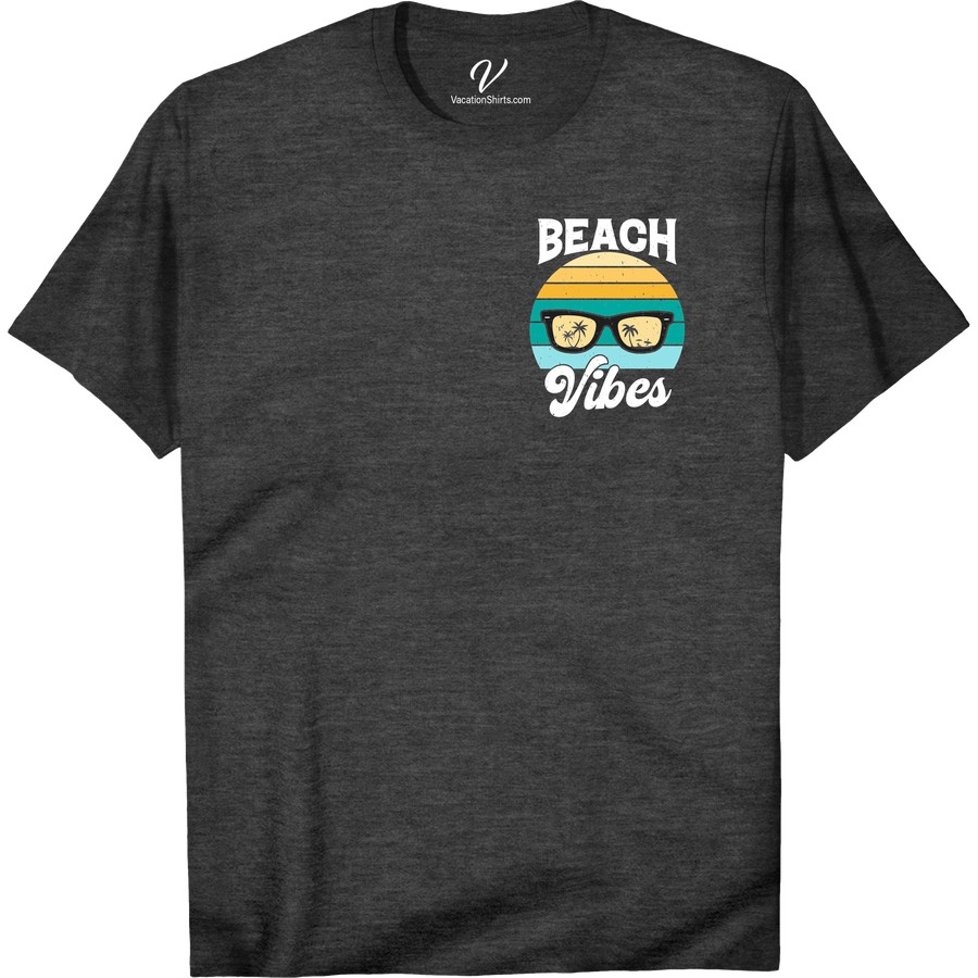 Beach Vibes Sunset Graphic Tee | Tropical Vacation Shirt Beach Vacation Shirts Embrace the ultimate beach vibes with our Sunset Graphic Tee. Perfect for any tropical vacation, this beachwear clothing is the ideal summer beach shirt. With a stunning beach sunset design, this vacation graphic tee is a must-have for any beach-themed wardrobe. Get your coastal graphic tee today!
