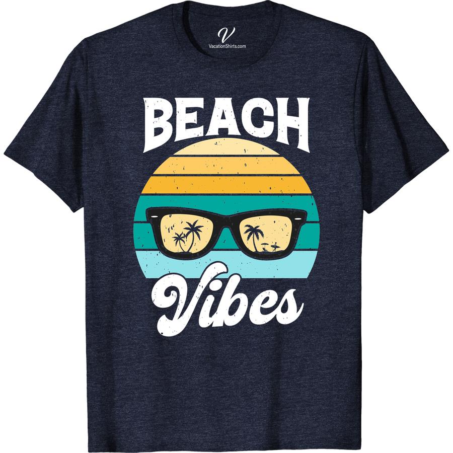Beach Vibes Sunset Graphic Tee | Tropical Vacation Shirt Beach Vacation Shirts Embrace the ultimate beach vibes with our Sunset Graphic Tee. Perfect for any tropical vacation, this beachwear clothing is the ideal summer beach shirt. With a stunning beach sunset design, this vacation graphic tee is a must-have for any beach-themed wardrobe. Get your coastal graphic tee today!