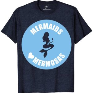 Mermaids & Mermosas Graphic Vacation Tee Beach Vacation Shirts Dive into summer with our Mermaids & Mermosas Graphic Vacation Tee! Perfect for mermaid lovers, this beach-themed apparel blends ocean-inspired clothing with tropical vacation vibes. Featuring a unique mermaid graphic, it's the ultimate coastal wear for any sea creature enthusiast. Elevate your summer fashion tops collection and make waves in style!