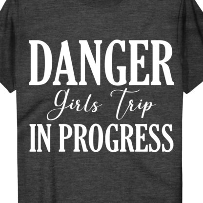 Danger Girls Trip Tee - Fun & Sassy Vacation Shirt  Get ready for your next adventure with our Danger Girls Trip Tee! This fun vacation shirt is perfect for your travel squad, with its sassy and humorous design. Whether you're on a girls getaway or a group vacation, this sassy girls trip top is sure to make a statement!