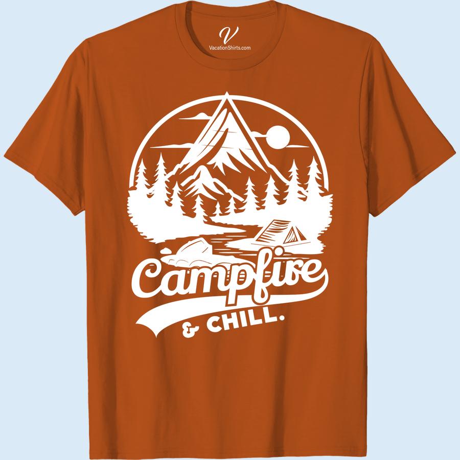 Adventure T-Shirt – Campfire & Chill: Mountains & Pine Forest Design Introducing our Adventure Campfire T-Shirt, a must-have addition to your outdoor lifestyle clothing collection. This Mountain Themed T-Shirt features a chill pine forest design that's perfect for wilderness adventures. Slip into this hiking graphic tee when you're ready to campfire & chill. A vacation t-shirt with an outdoorsy graphic and a nod to nature adventure, it's perfect for those who love the great outdoors!