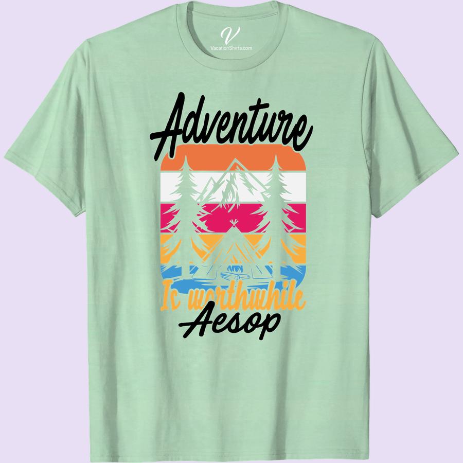 Adventure Tee: Aesop Worthwhile – Mountains, Sunset & Campfire Explore the peaks with our Aesop Worthwhile Adventure Tee. This Mountain Adventure T-shirt showcases stunning sunset & campfire graphic - your perfect vacation shirt! Join the outdoor adventure apparel revolution with this enchanting Campfire Adventure garb. Adventure Travel Merchandise never looked so outstanding. Embrace the journey with Aesop Worthwhile Travel Tees.