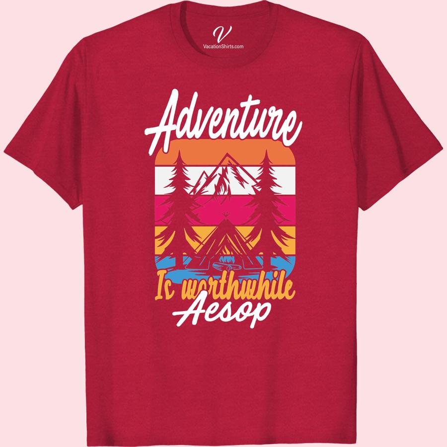 Adventure Tee: Aesop Worthwhile – Mountains, Sunset & Campfire Explore the peaks with our Aesop Worthwhile Adventure Tee. This Mountain Adventure T-shirt showcases stunning sunset & campfire graphic - your perfect vacation shirt! Join the outdoor adventure apparel revolution with this enchanting Campfire Adventure garb. Adventure Travel Merchandise never looked so outstanding. Embrace the journey with Aesop Worthwhile Travel Tees.