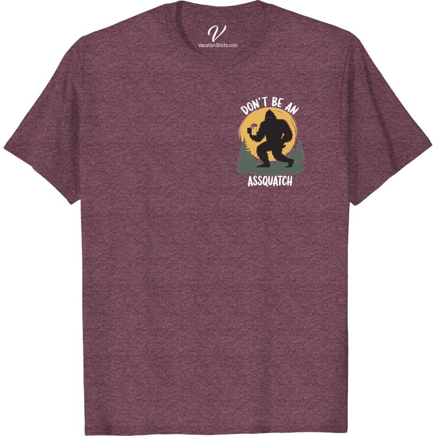 Funny Sasquatch T-Shirt - Don't Be an Assquatch Vacation Tee Discover your fun side with our Don't Be an Assquatch Tee. This Sasquatch Vacation T-Shirt, with its Bigfoot Sasquatch Joke, is sure to spread laughter. The perfect blend of Sasquatch Humor, our Funny Sasquatch Shirt SEO Keyword and Bigfoot Funny T-Shirt is the ideal addition to any vacation ensemble.