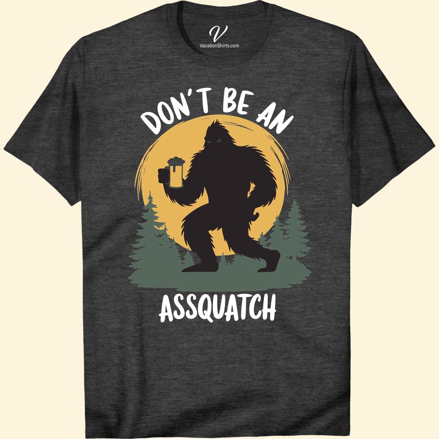 Funny Sasquatch T-Shirt - Don't Be an Assquatch Vacation Tee Discover your fun side with our Don't Be an Assquatch Tee. This Sasquatch Vacation T-Shirt, with its Bigfoot Sasquatch Joke, is sure to spread laughter. The perfect blend of Sasquatch Humor, our Funny Sasquatch Shirt SEO Keyword and Bigfoot Funny T-Shirt is the ideal addition to any vacation ensemble.