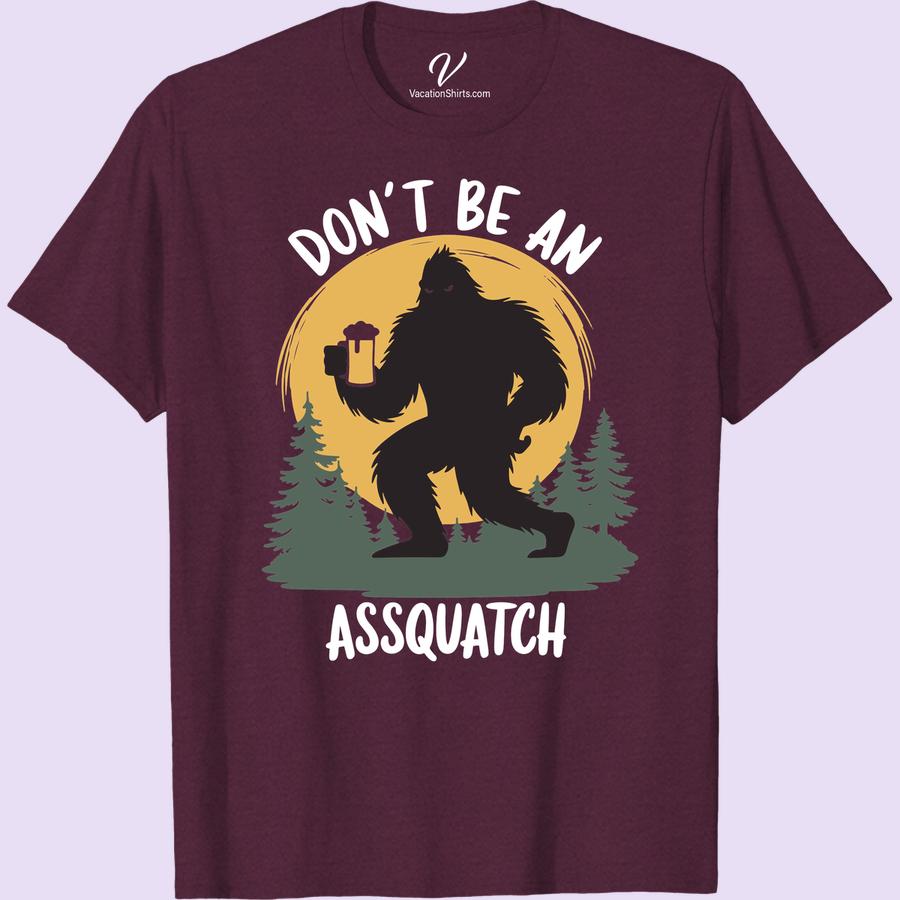 Funny Sasquatch T-Shirt - Don't Be an Assquatch Vacation Tee Discover your fun side with our Don't Be an Assquatch Tee. This Sasquatch Vacation T-Shirt, with its Bigfoot Sasquatch Joke, is sure to spread laughter. The perfect blend of Sasquatch Humor, our Funny Sasquatch Shirt SEO Keyword and Bigfoot Funny T-Shirt is the ideal addition to any vacation ensemble.