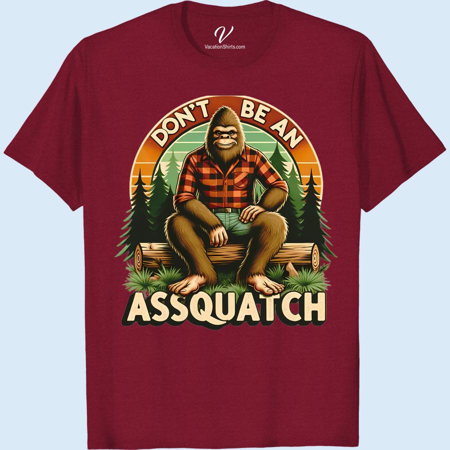 Sasquatch Plaid Tee - Don’t Be An Assquatch Funny Vacation Shirt Unleash your humor with our Funny Sasquatch Tee! This Bigfoot Plaid Vacation Shirt, with its fun Don't Be An Assquatch print, is the perfect comical vacation outfit. Not just your average Assquatch Joke Tee, but a symbol of fun Sasquatch apparel and vacation humor t-shirt rolled into one!