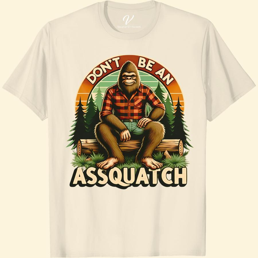 Sasquatch Plaid Tee - Don’t Be An Assquatch Funny Vacation Shirt Unleash your humor with our Funny Sasquatch Tee! This Bigfoot Plaid Vacation Shirt, with its fun Don't Be An Assquatch print, is the perfect comical vacation outfit. Not just your average Assquatch Joke Tee, but a symbol of fun Sasquatch apparel and vacation humor t-shirt rolled into one!