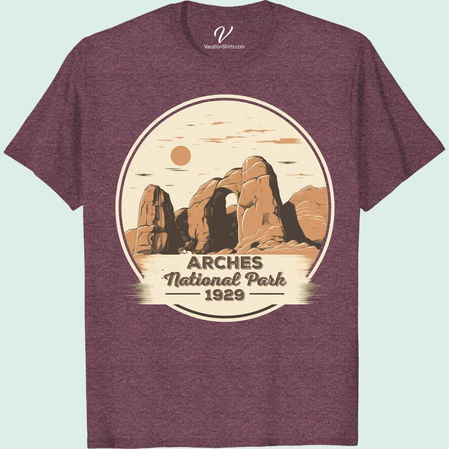 Vintage Arches National Park 1929 Tee - Sun & Rocks Design Show off your love for classic American landscapes with our Arches National Park Vintage Tee. A tribute to 1929, this Sun & Rocks Design Tee is a must-have for fans of National Park vintage t-shirts. Dive into the past with our retro, chic Vintage Vacation Tees featuring iconic Arches Park sun design.